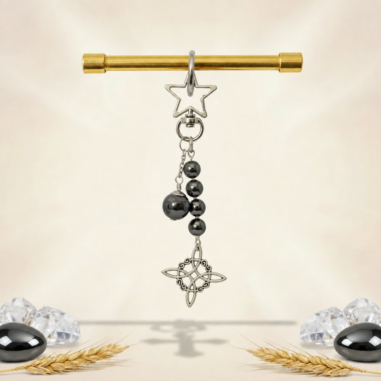 Bijou de sac / porte-clés hématite, nœud de sorcière
