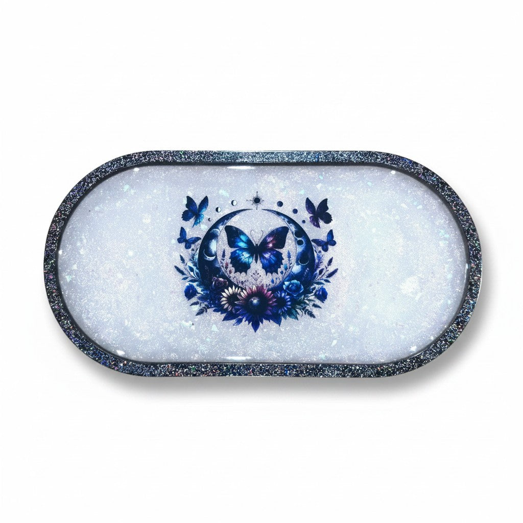 Plateau vide-poche AlyJoyCreation ovale en résine blanche pailletée avec motif papillon bleu et fleurs féériques