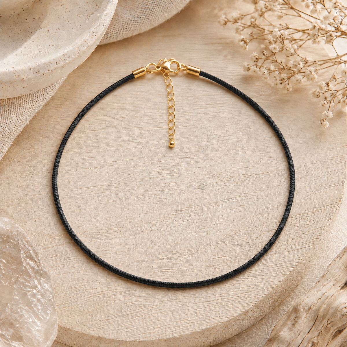 Cordon noir pour pendentif avec embouts dorés et chaînette de rallonge